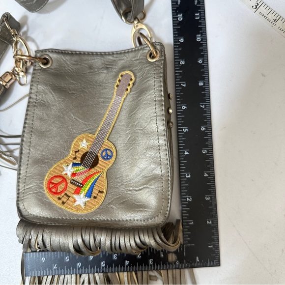 Champagne Rocker Faux Leather with Guitar and Fringe Metallic Crossbody - Picture 6 of 7